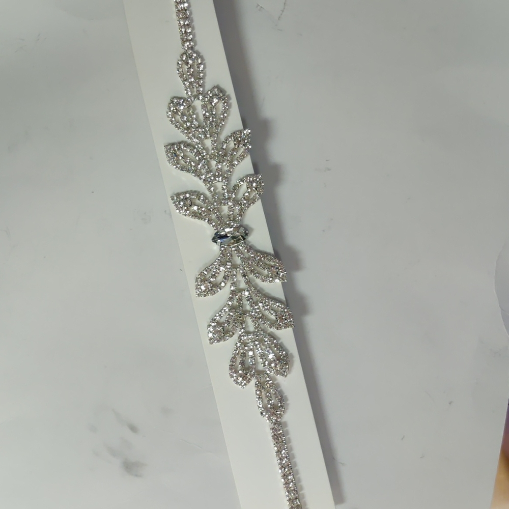 Rhinestone headband on black elastic